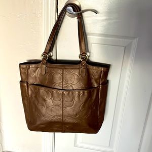 EUC all bronze leather embossed Coach north south tote with COA